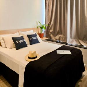 Una cama o camas en una habitación de Capsula Hotel Sao Paulo - Paulista