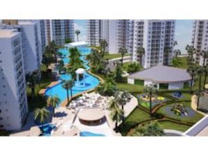 an aerial view of a resort with a swimming pool at Hotel apartment studio in Dherinia +3 photos