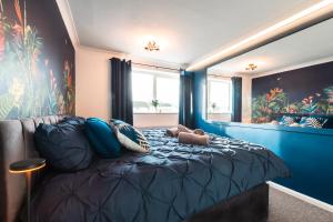 Ένα ή περισσότερα κρεβάτια σε δωμάτιο στο Free Parking 11 Guests Family&Contractors Bedford