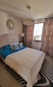 Ένα ή περισσότερα κρεβάτια σε δωμάτιο στο Garden of Eden - Panorama C15 Rey&Mar