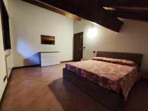 Postel nebo postele na pokoji v ubytování Locazione Turistica