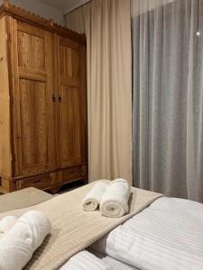 En eller flere senge i et værelse på Apartament Kryształowy Potok