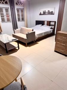 Ένα ή περισσότερα κρεβάτια σε δωμάτιο στο Green Terrace Residence Phuket