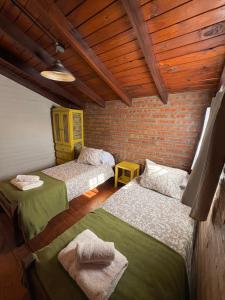 Ένα ή περισσότερα κρεβάτια σε δωμάτιο στο Sierra Dulce