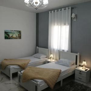 Postel nebo postele na pokoji v ubytování Mahrad Hostel