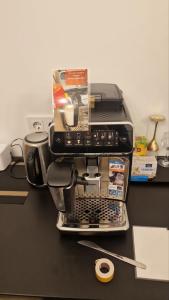 a coffee maker sitting on top of a counter at Kaunas Studios - RentA 18 in Kaunas