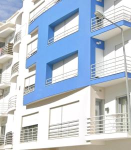 an apartment building with a blue facade at Lux & Design Private Room - Montijo, Lisbon in Montijo