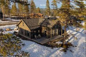 an aerial view of a house in the snow at TH2124- Spacious ski-in out cabin in Trysilfjell with 5 bedrooms in Hovi