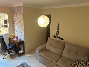 Χώρος καθιστικού στο Apartamento em Volta Redonda