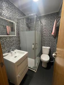 a bathroom with a shower and a sink and a toilet at Lux & Design Private Room - Montijo, Lisbon in Montijo
