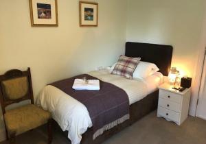 Ένα ή περισσότερα κρεβάτια σε δωμάτιο στο Cote Ghyll Mill Bed & Breakfast at Osmotherley