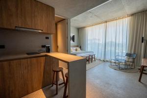 Kuchyň nebo kuchyňský kout v ubytování CasaChica Hotel