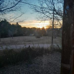 Solopgangen eller solnedgangen set fra feriehuset