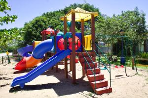 Legeområdet for børn på Apê Aconchego - Capri Morada & Mar - Lateral Mar