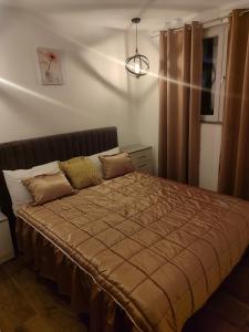 Una cama o camas en una habitación de A&H Pliva Retreat