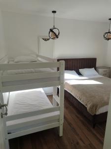 Una cama o camas en una habitación de A&H Pliva Retreat