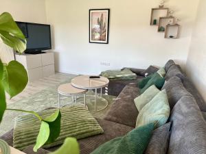 Μια τηλεόραση ή/και κέντρο ψυχαγωγίας στο Ferienhaus am Hang