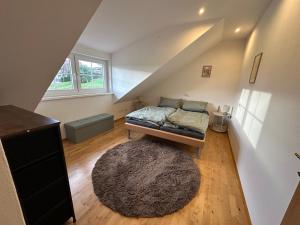 Ένα ή περισσότερα κρεβάτια σε δωμάτιο στο Ferienhaus am Hang