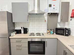 Køkken eller tekøkken på County House - 5 Bedroom Deluxe Apartment + 18 billeder