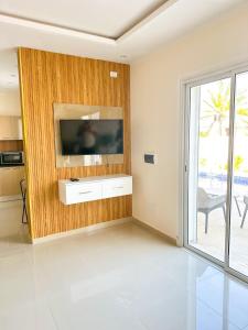 TV a/nebo společenská místnost v ubytování Villa Saba