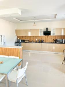 Kuchyň nebo kuchyňský kout v ubytování Villa Saba