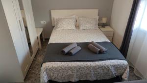 Ένα ή περισσότερα κρεβάτια σε δωμάτιο στο BNB LOLA - Habitacion privada - Aire acondicionado - Baños compartidos