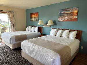 Ένα ή περισσότερα κρεβάτια σε δωμάτιο στο Table Rock Motel +3 φωτογραφίες