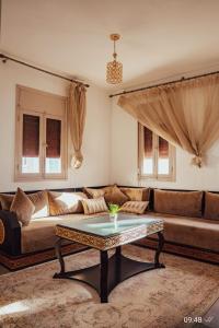 Гостиная зона в Maison pres plus Grand Bazar d'Afrique Souk El Had