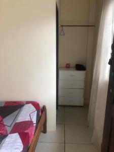 Un pat sau paturi într-o cameră la Hospedaje Maluli 09