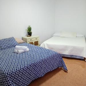 Ένα ή περισσότερα κρεβάτια σε δωμάτιο στο Casa Eden