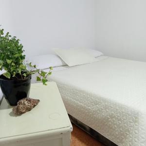 Ένα ή περισσότερα κρεβάτια σε δωμάτιο στο Casa Eden