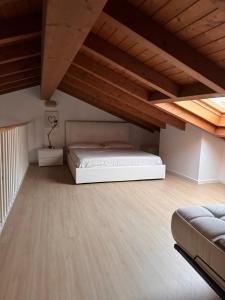 Ένα ή περισσότερα κρεβάτια σε δωμάτιο στο A&A Bellini