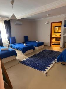 Ένα ή περισσότερα κρεβάτια σε δωμάτιο στο Villa Léa 1