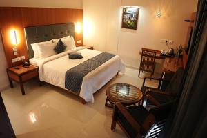 Ένα ή περισσότερα κρεβάτια σε δωμάτιο στο Hotel Krithick grand