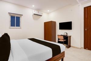 TV a/nebo společenská místnost v ubytování Super Townhouse Preet Vihar Metro Station