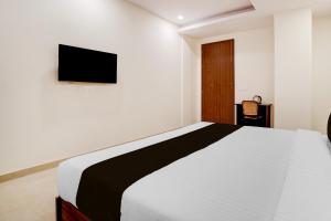 TV a/nebo společenská místnost v ubytování Super Townhouse Preet Vihar Metro Station + 23 fotografií