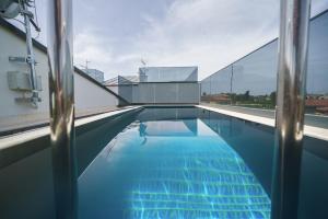 Swimmingpoolen hos eller tæt på Villa TRIA QUERCUS