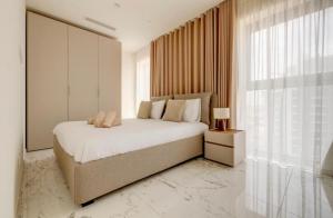 Ένα ή περισσότερα κρεβάτια σε δωμάτιο στο IsLe Mercury Tower By DIoOR +30 φωτογραφίες