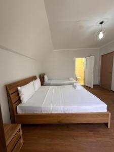 Postel nebo postele na pokoji v ubytování Lagusheda