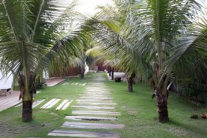 En have udenfor Chalé Lua pé na areia na propriedade DivinoRecanto