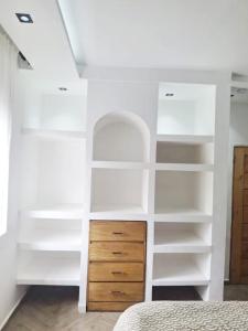 Giường trong phòng chung tại Marietou