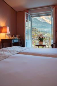 Una cama o camas en una habitación de Hotel Regina