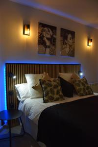 Ένα ή περισσότερα κρεβάτια σε δωμάτιο στο Alojamiento El Rincón de Rosa