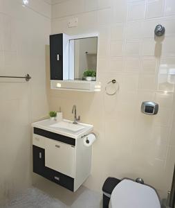 Et badeværelse på Belíssimo Apê, a 5 min da Praia, até 4 pessoas.