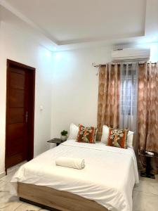 Ένα ή περισσότερα κρεβάτια σε δωμάτιο στο Modern cosy 2Bed 2bath