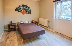 Ένα ή περισσότερα κρεβάτια σε δωμάτιο στο En apartment in central Finspång, 2 bathrooms