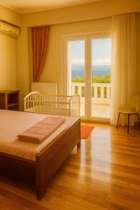 Ένα ή περισσότερα κρεβάτια σε δωμάτιο στο Caecilia & Lawrence Villa