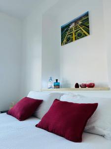 Un pat sau paturi într-o cameră la Appartamenti reali - I giardini reali