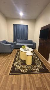 TV a/nebo společenská místnost v ubytování فندق اجنحة السمو إن الفندقية