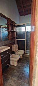 El Mangrullo في فيديراسيون: حمام مع مرحاضين ومغسلة